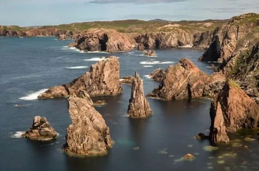 Day 8: Broad Bay — Island Charm Zi = As the sun rises over the Outer Hebrides, you'll continue your odyssey with a journey to
