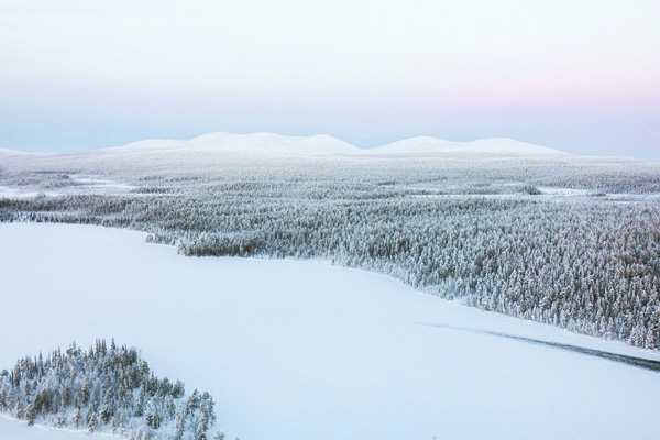 Overnight train journey from Helsinki through snowy Finnish forests towards Finnish Lapland